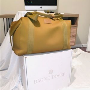 Dagne Dover, Landon Carryall designer bag.